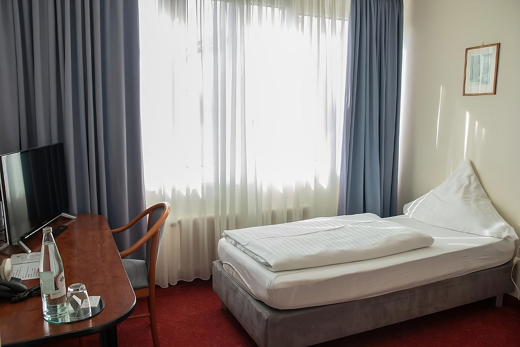 Einzelzimmer mit Balkon